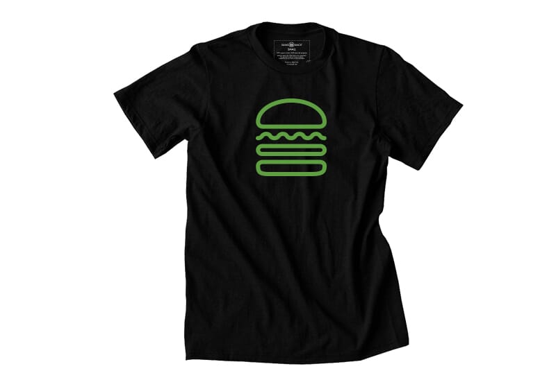 Full image of the front of the Black tee.