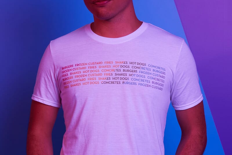 Close up image of person wearing Super Soft Unisex Tee